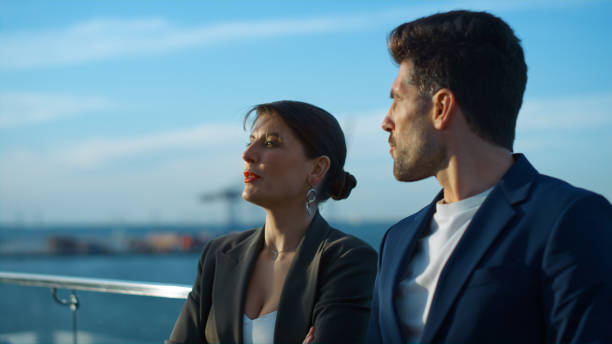 istock Cheerful business couple talk outdoors closeup. Smiling partners discuss project 1456613549