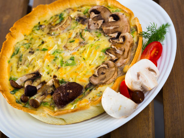 istock Delicious french  open pie with cheese and mushrooms 1456614801