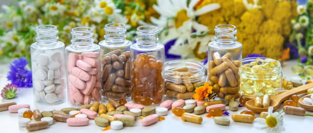 istock Homeopathy and dietary supplements from medicinal herbs. Selective focus. 1456616895