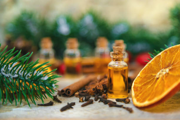 istock Christmas essential oils in small bottles. Selective focus. 1456616929