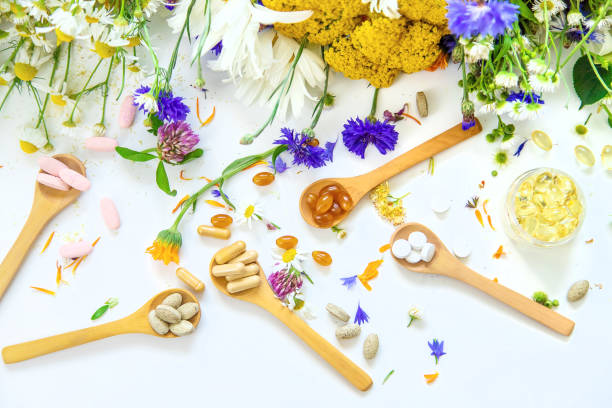 istock Homeopathy and dietary supplements from medicinal herbs. Selective focus. 1456616935