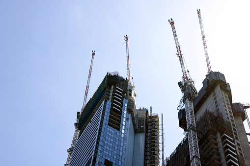 Construction of skyscrapers in the city, background with copy space, full frame horizontal composition, Sydney Australia