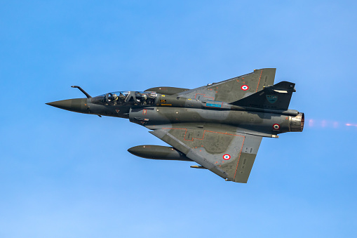 French Air Force Dassault Mirage 2000 fighter jet plane taking off from Leeuwarden Air Base. Leeuwarden, The Netherlands - April 19, 2018