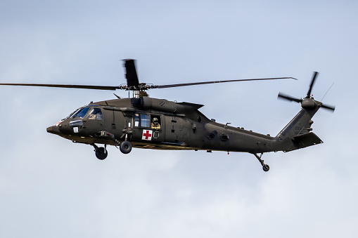 United States Army Sikorsky UH-60M Blackhawk medevac helicopter in flight. Welschap, The Netherlands - July 6, 2020