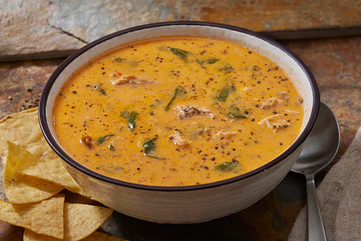 Spicy Mexican Chicken Tortilla Soup with Spinach, Peppers and Onions