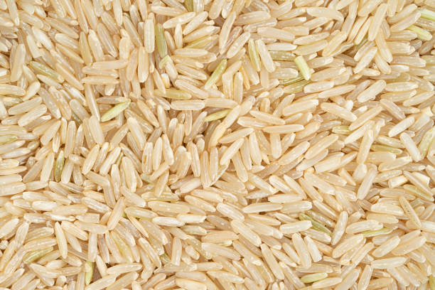 istock Whole grain brown rice texture. Top view, close up 1456627300