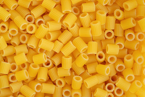 Italian pasta ditali rigati background. Top view, directly above