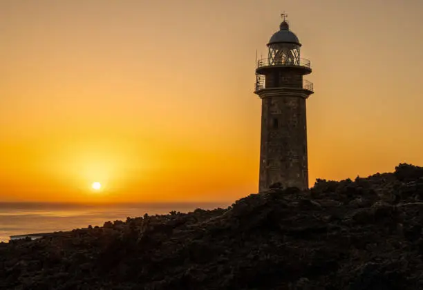 Sunset  at Punta Orchilla lighthouse, el Hierro Island, Santa Cruz de Tenerife, Spain
