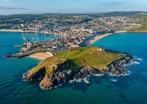 St Ives, Cornwall. United Kingdom. 08.24.2021 A lovely Aerial Image of St Ives Head and Harbour at Sunrise. 24th August 2021.