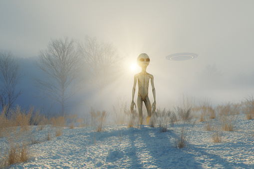 Alien walking in winter landscape. 3D generated image.
