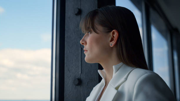 istock Thoughtful businesswoman looking window closeup. Successful ceo consider issues 1456633942
