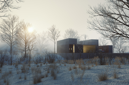 Modern concrete house in winter landscape. 3D generated image.