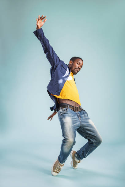 istock Confident Happy Smiling African Man Dancing And Enjoying In The Studio 1456634434