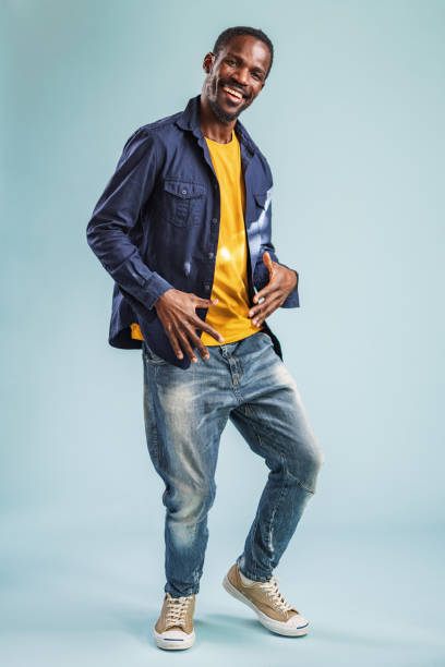Mature Confident Happy Smiling African Man Dancing In The Studio