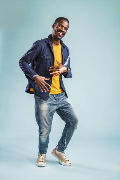 istock Confident Happy Smiling African Man Dancing And Enjoying In The Studio 1456634460