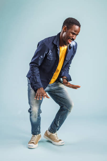 istock Confident Happy Smiling African Man Dancing And Enjoying In The Studio 1456634463