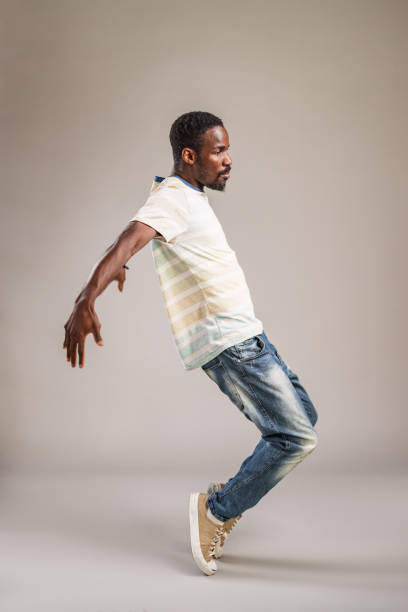 istock African Man Dancing Hip Hop In The Studio 1456634696