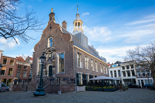 Schiedam, Netherlands - January 2023: Picturesque old city hall on the town square in Schiedam, Holland.