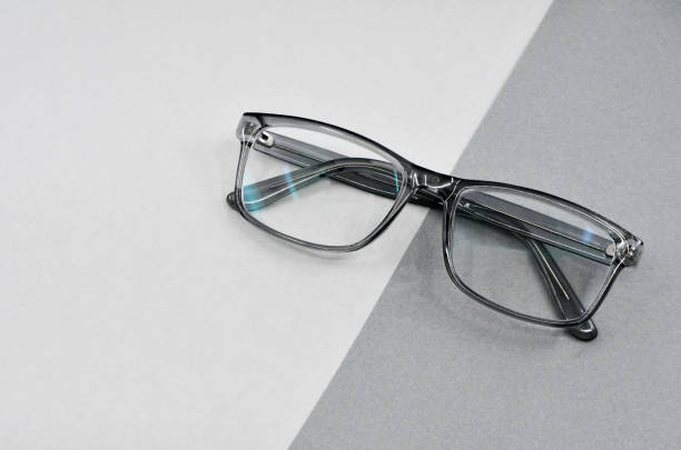 istock Pair of glasses on a two one grey background 1456637422