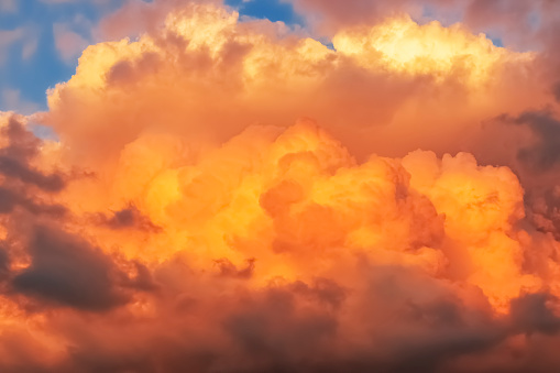 fiery orange clouds , surreal color of the sky , fantastic colors of nature