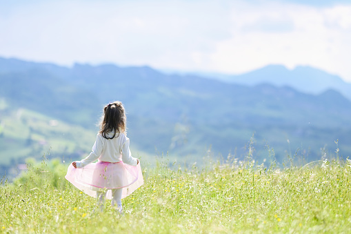 trekking with her family. Happy summer vacation and healthy lifestyle concept. Unity with nature. Freedom of action