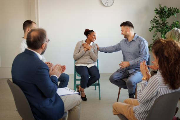 istock People attending self help therapy group meeting in community center 1456645437
