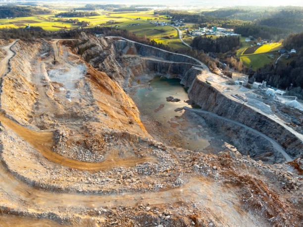 istock Stone quarry with landscape in background aerial drone view 1456646760