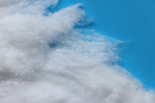 White cotton on blue background