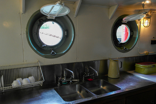 a clean sink in inside a ship