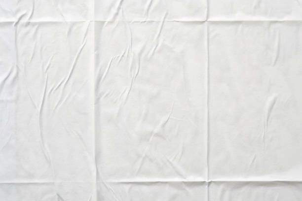 istock white crumpled and creased paper poster texture background 1456659167