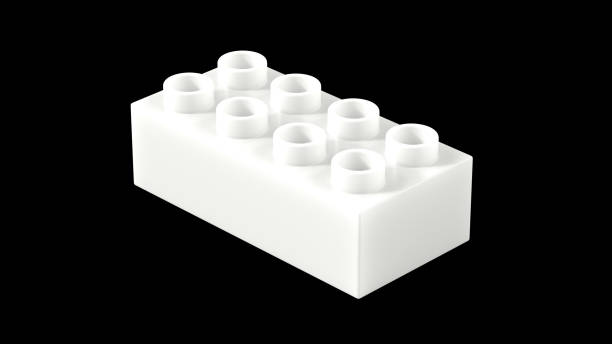 istock Bright White Plastic Toy Block Isolated on a Black Background. 1456660192