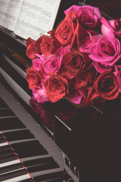 istock A bouquet of roses on a piano 1456660877