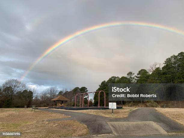 Rainbow Over The Playground Stock Photo - Download Image Now - Above, Beauty In Nature, Bench