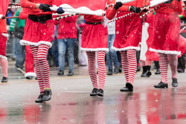 Photo of Marchers in a Santa holiday parade