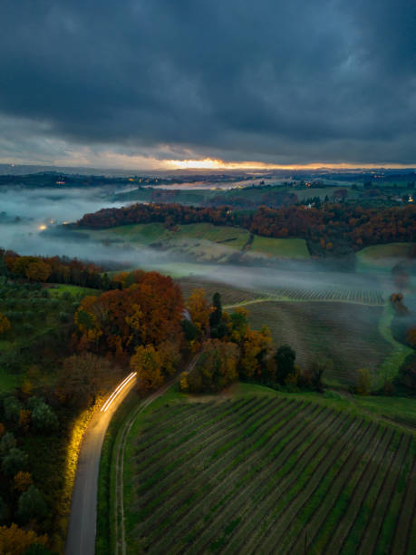 istock Chianti hills in sunset fog at night 1456662791