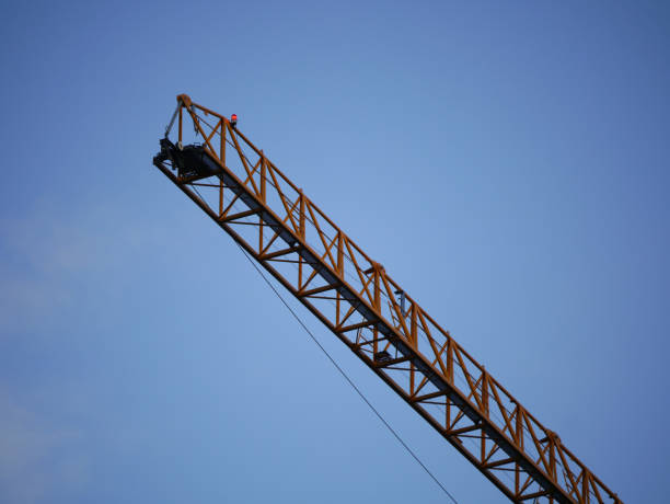 istock Low angle view of construction crane against blue sky 1456669208