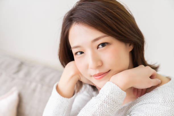 istock attractive asian woman relaxing 1456674578