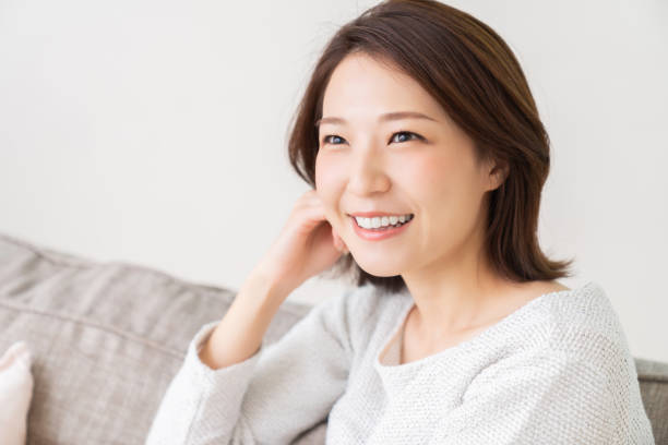 istock attractive asian woman relaxing 1456674609