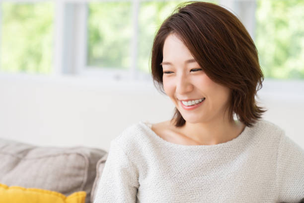 istock attractive asian woman relaxing 1456674634