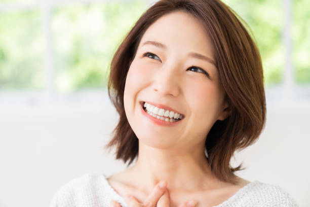 istock attractive asian woman relaxing 1456674690