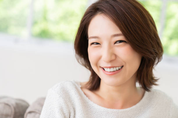istock attractive asian woman relaxing 1456674711