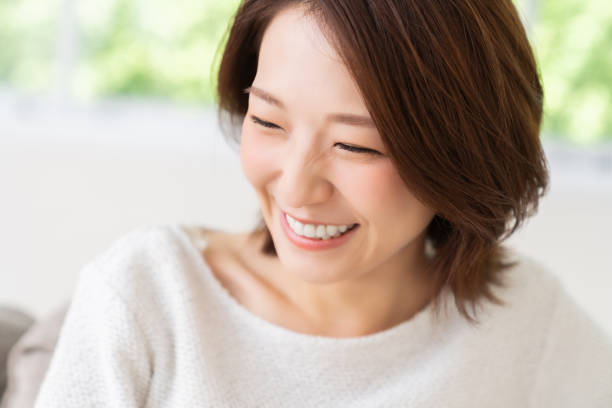 istock attractive asian woman relaxing 1456674724