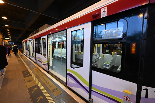 Hong Kong Light Rail (LRT) Platform and train in tin shui wai, hong kong - 01/07/2023 17:23:20 +0000