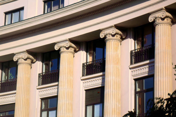 architectural column from old building exterior - ionic imagens e fotografias de stock