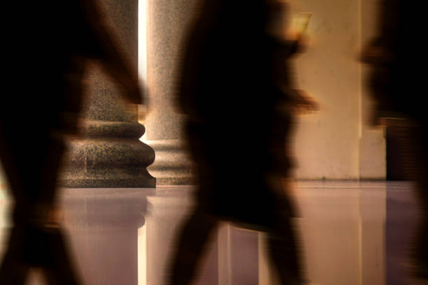 Blurred motion people in public building