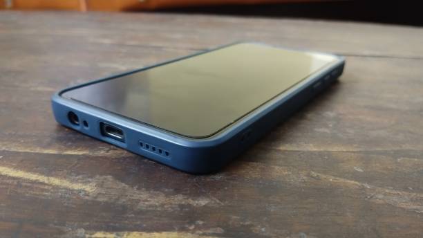 istock mobile phone on the wooden table 1456679661
