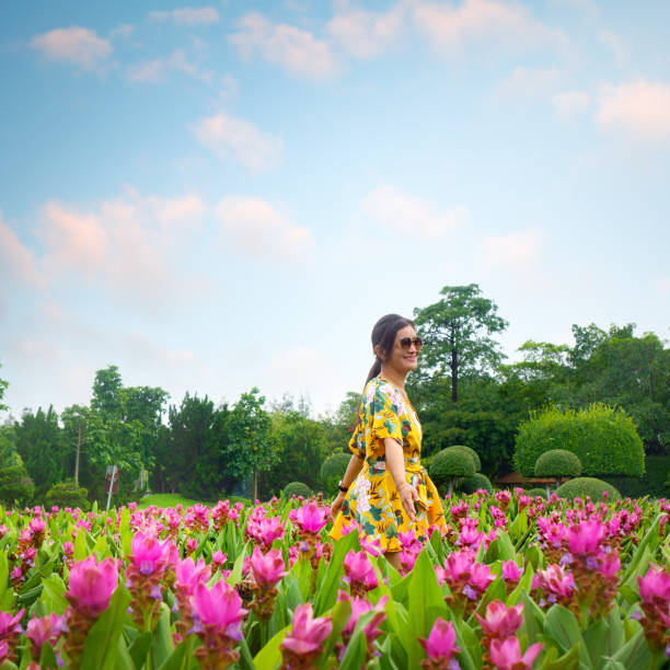 Young woman in public park in Bangkok, Thailand