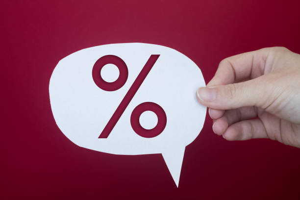 istock Speech bubble in front of colored background with Percentage Sign. 1456696804