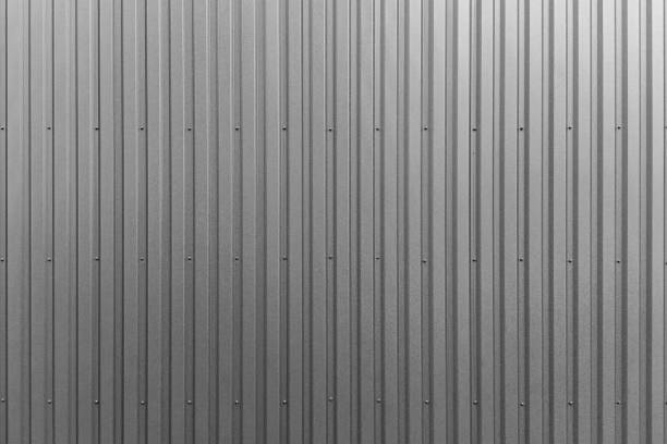 暗い灰色の波形金属の背景とテクスチャ表面 - corrugated iron ストックフォトと画像