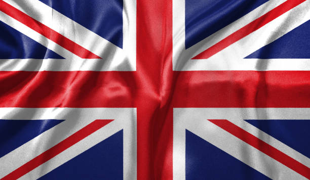 istock United Kingdom flag wave highly detailed realistic 3D rendering. 1456707016